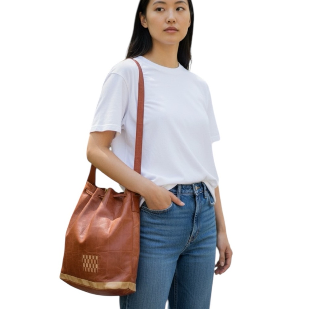 Handcrafted Genuine Cow Leather Tote with Drawstring Closure and Braided Strap